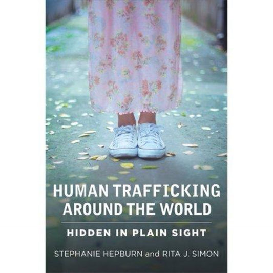 Human Trafficking Around the World : Hidden in Plain Sight (Paperback)